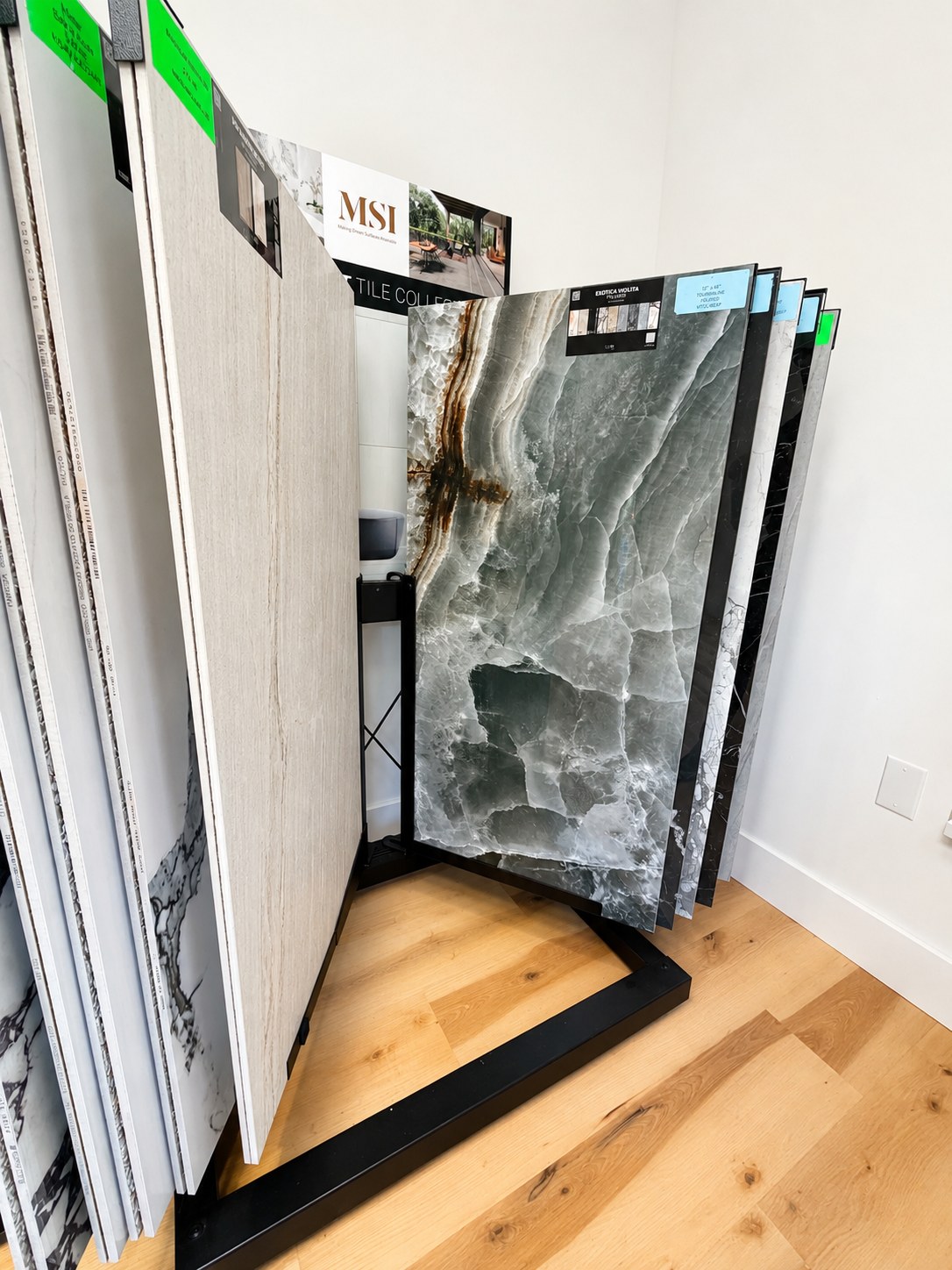 Full-size countertop and tile slab panels in the showroom